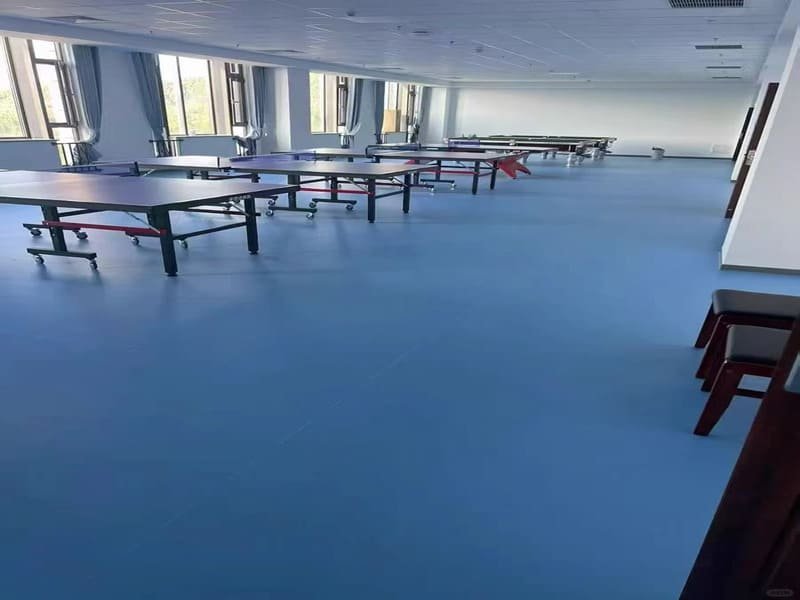 Subfloor preparation and PVC seam welding installation process